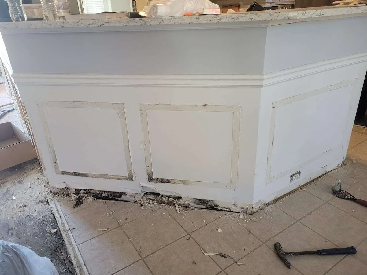 Water damage and mold on kitchen during Sewage Cleanup & Sanitation in Port LaBelle